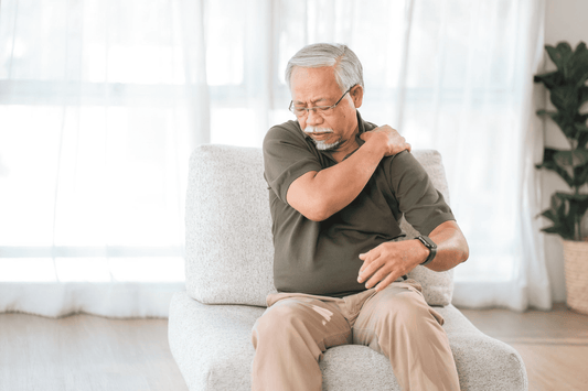 Older Indian man with shoulder pain